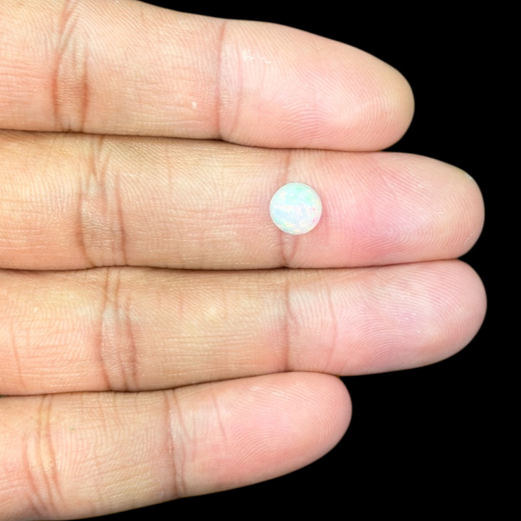 Natural White Ethiopian Opal Stone 0.89 Carats Round Cabochon Shape Size 7 mm 
