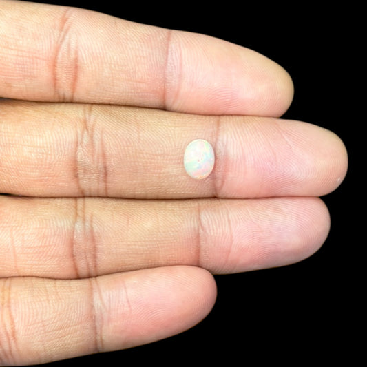 Natural White Ethiopian Opal Stone 0.91 Carats Oval Cabochon Shape 8.1 x 6.1 x 3.7 mm