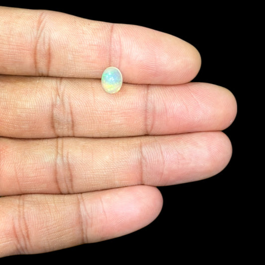 Natural White Ethiopian Opal Stone 0.98 Carats Oval Cabochon Shape 8.1 x 6.2 x 3.8 mm