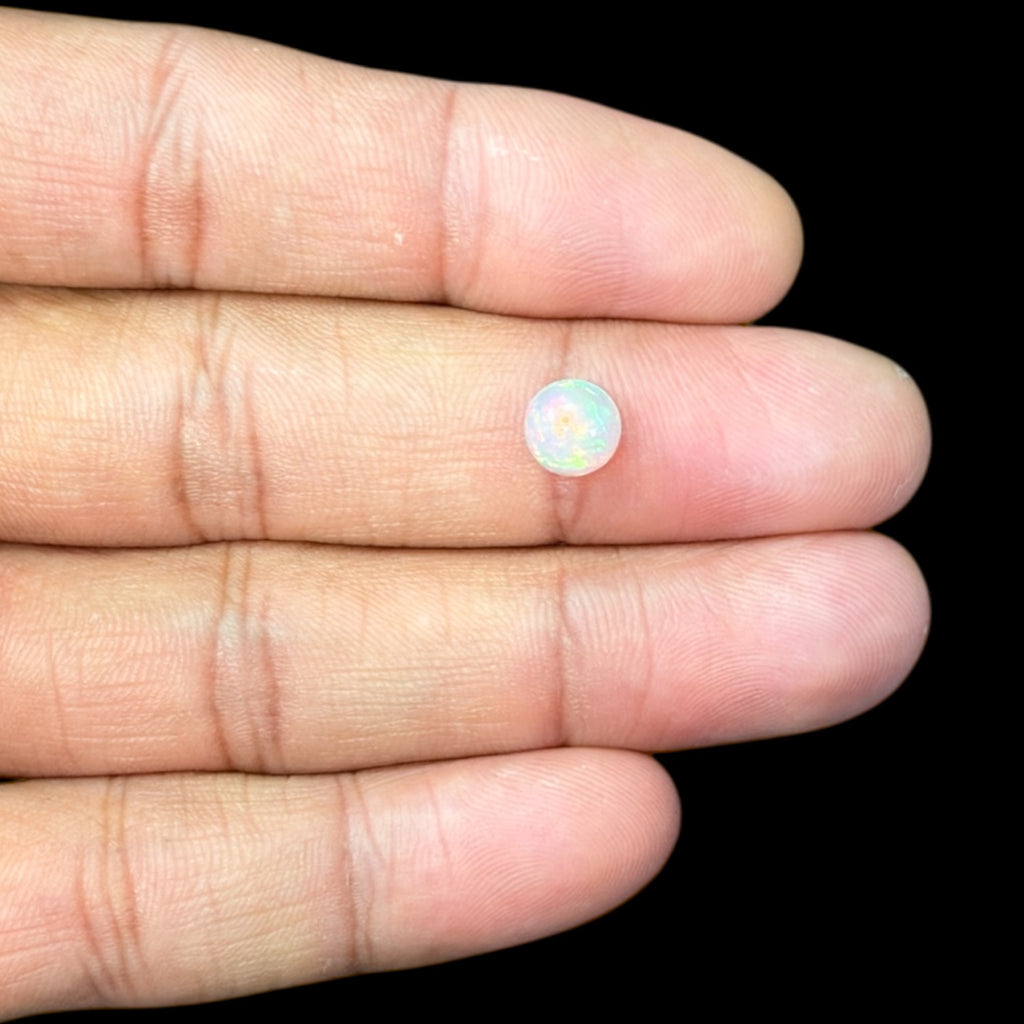 Natural White Ethiopian Opal Stone 1.09 Carats Round Cabochon Shape Size 7.1 mm 