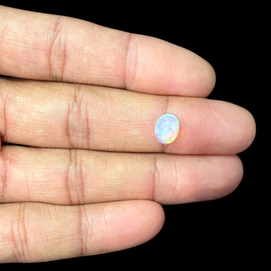 Natural White Ethiopian Opal Stone 1.55 Carats Oval Cabochon Shape 9.2 x 7.1 x 4.9 mm