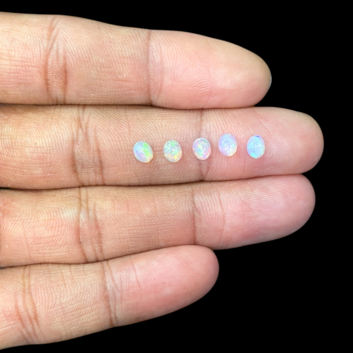Natural White Ethiopian Opal Stone 10.11 Carats Oval Cabochon Shape 5 x 4 mm