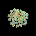 Natural White Ethiopian Opal Stone 10.11 Carats Oval Cabochon Shape 5 x 4 mm