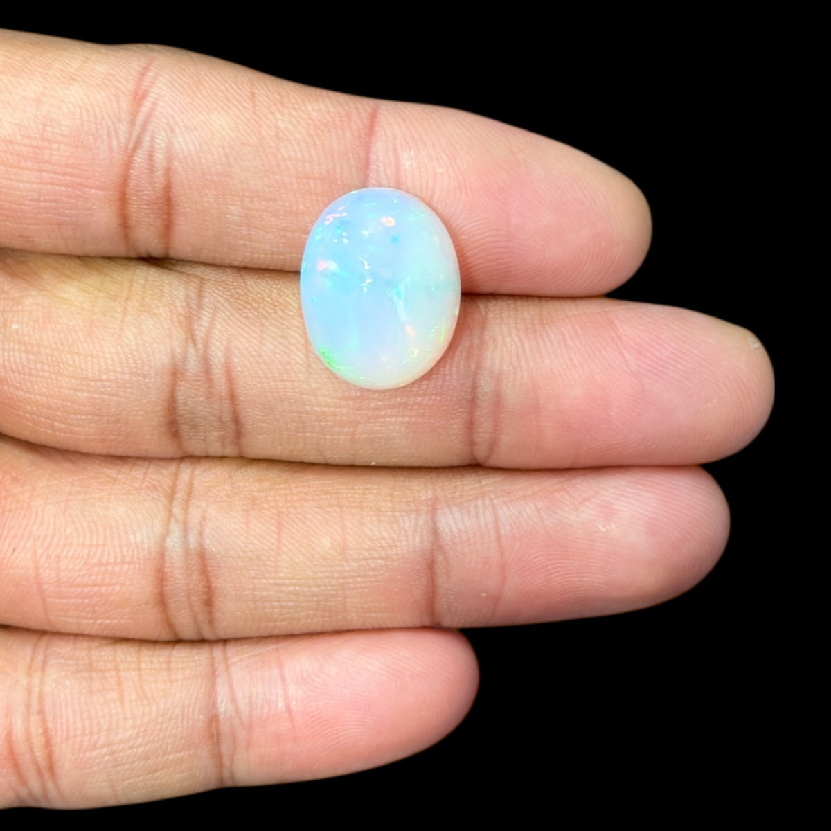 Natural White Ethiopian Opal Stone 10.82 Carats Oval Cabochon Shape Size 18.5 x 14..5 x 7.7 mm