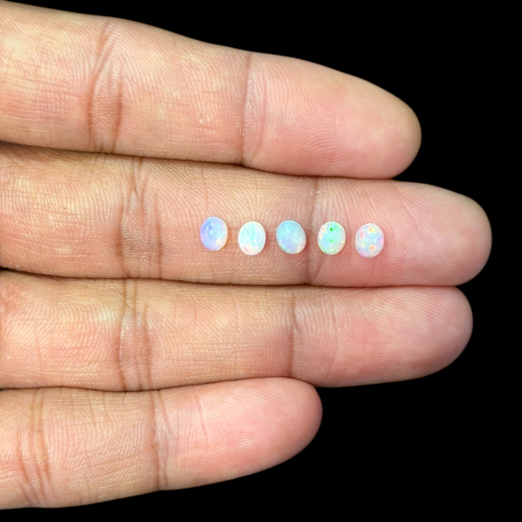 Natural White Ethiopian Opal Stone 11.06 Carats Oval Cabochon Shape 5 x 4 mm