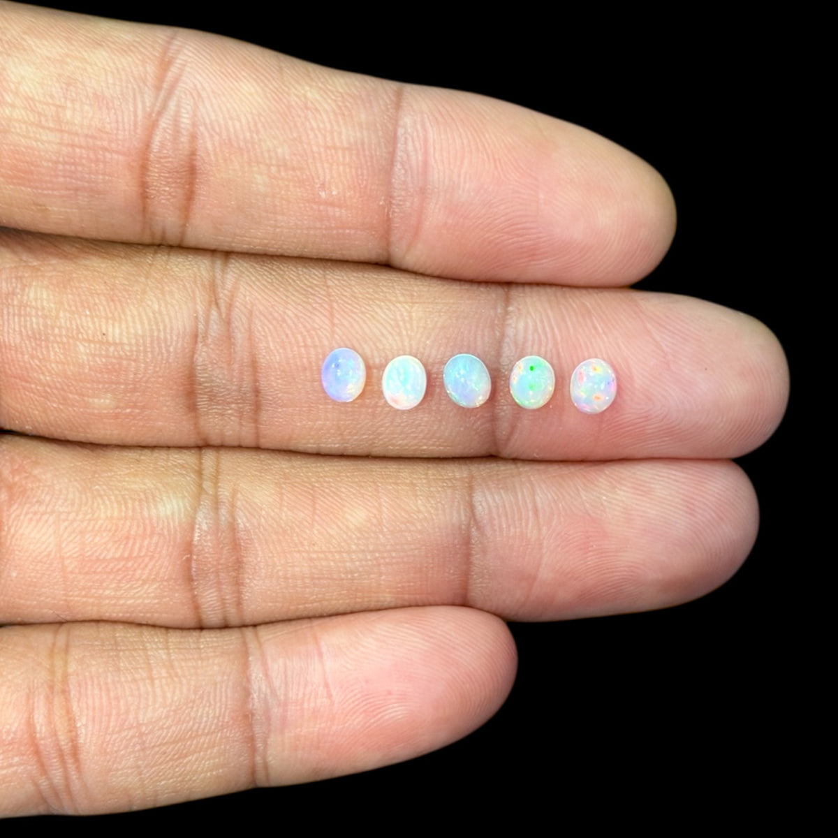 Natural White Ethiopian Opal Stone 11.06 Carats Oval Cabochon Shape 5 x 4 mm