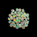 Natural White Ethiopian Opal Stone 11.06 Carats Oval Cabochon Shape 5 x 4 mm