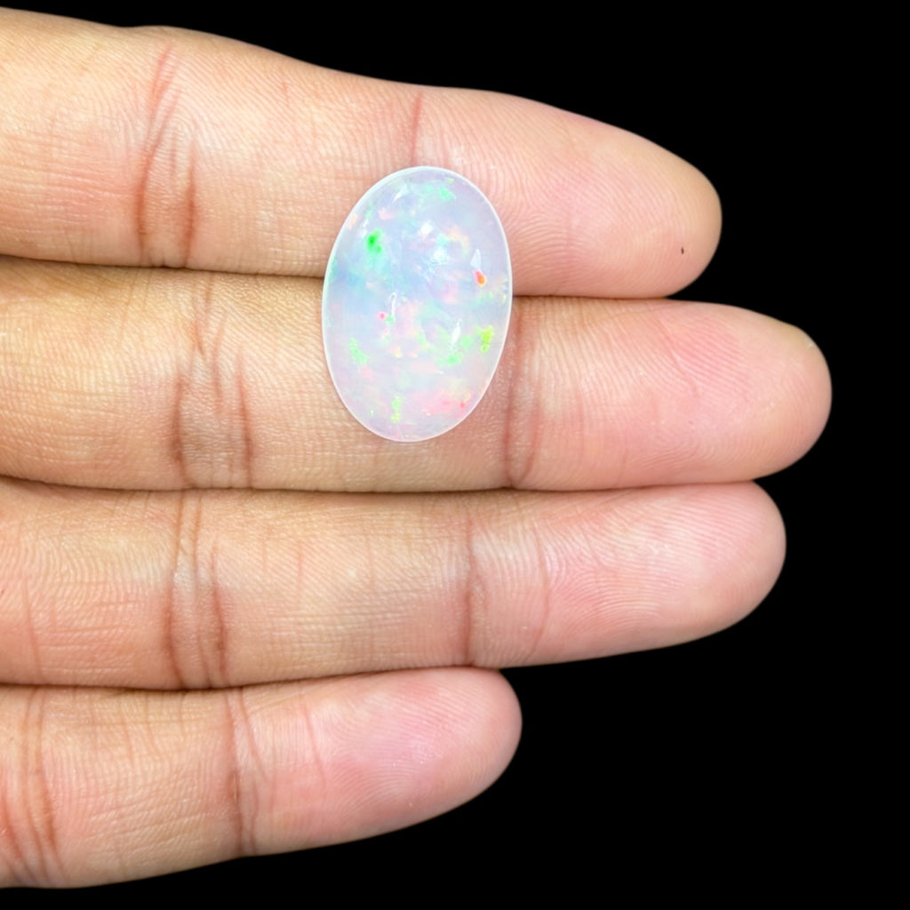 Natural White Ethiopian Opal Stone 11.11 Carats Oval Cabochon Shape 22.7 x 15.4 x 6.1 mm