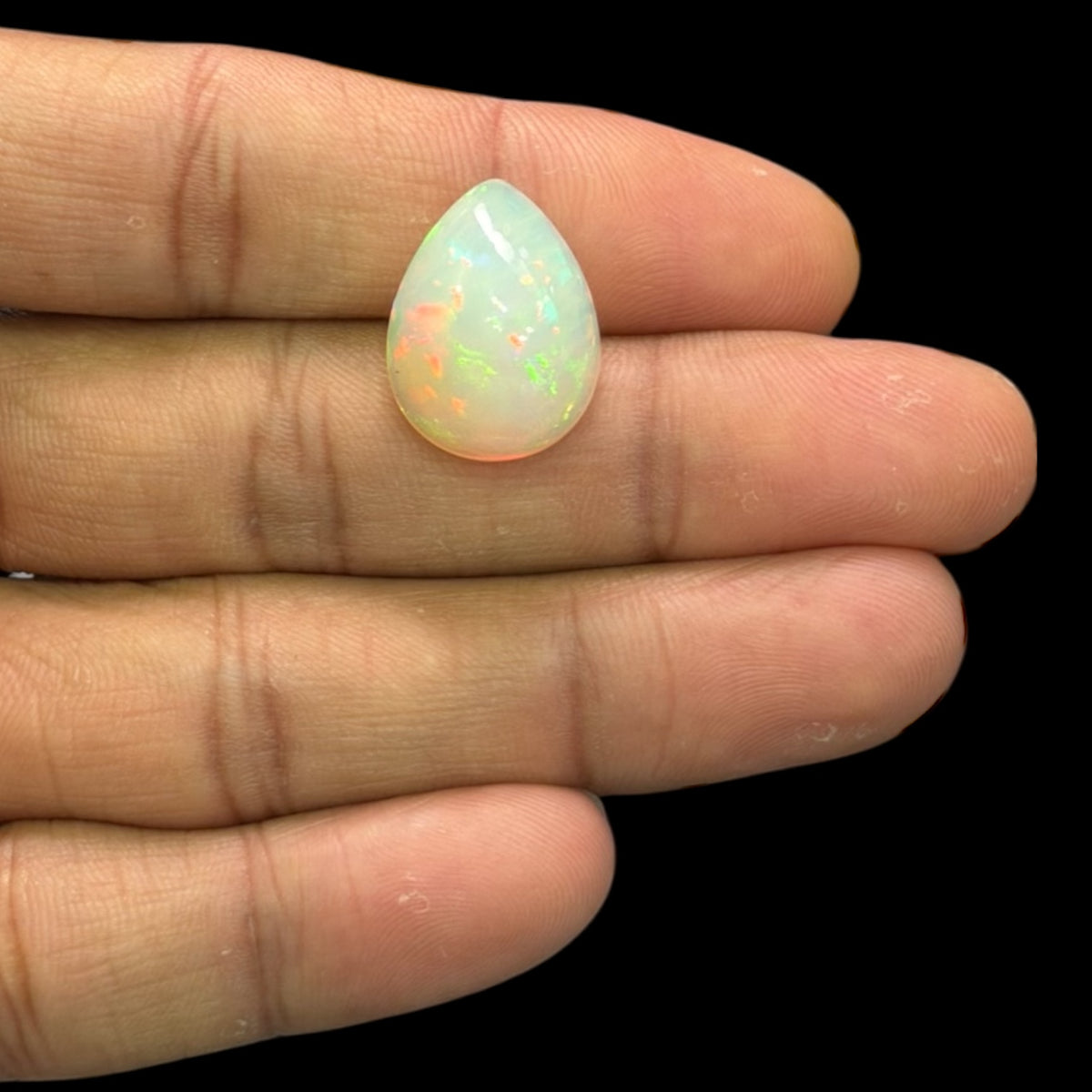 Natural White Ethiopian Opal Stone 12.18 Carats Pear Cabochon Shape 19.9 x 15 x 9.2 mm