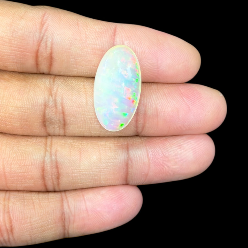 Natural White Ethiopian Opal Stone 12.77 Carats Oval Cabochon Shape 25.7 x 13.8 x 7.3 mm