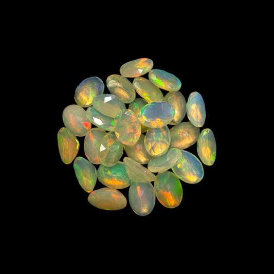 Natural White Ethiopian Opal Stone 14.78 Carats Oval Cabochon Shape 7 x 5 mm