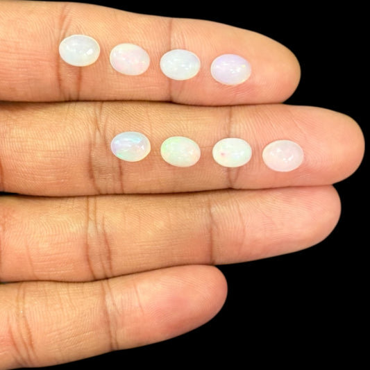 Natural White Ethiopian Opal Stone 15.18 Carats Oval Cabochon Shape 8 x 6 mm