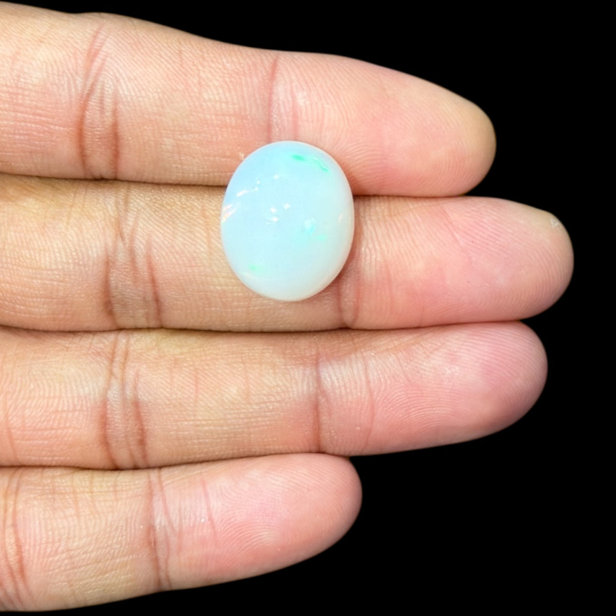 Natural White Ethiopian Opal Stone 15.74 Carats Oval Cabochon Shape Size 18.9 x 15.8 x 9.5 mm