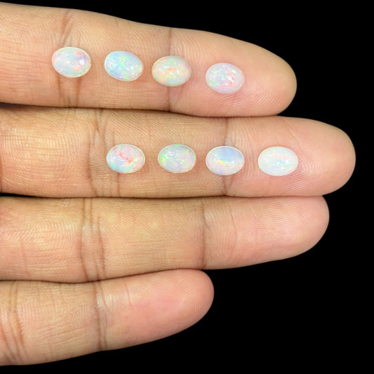 Natural White Ethiopian Opal Stone 15.75 Carats Oval Cabochon Shape 8 x 6 mm