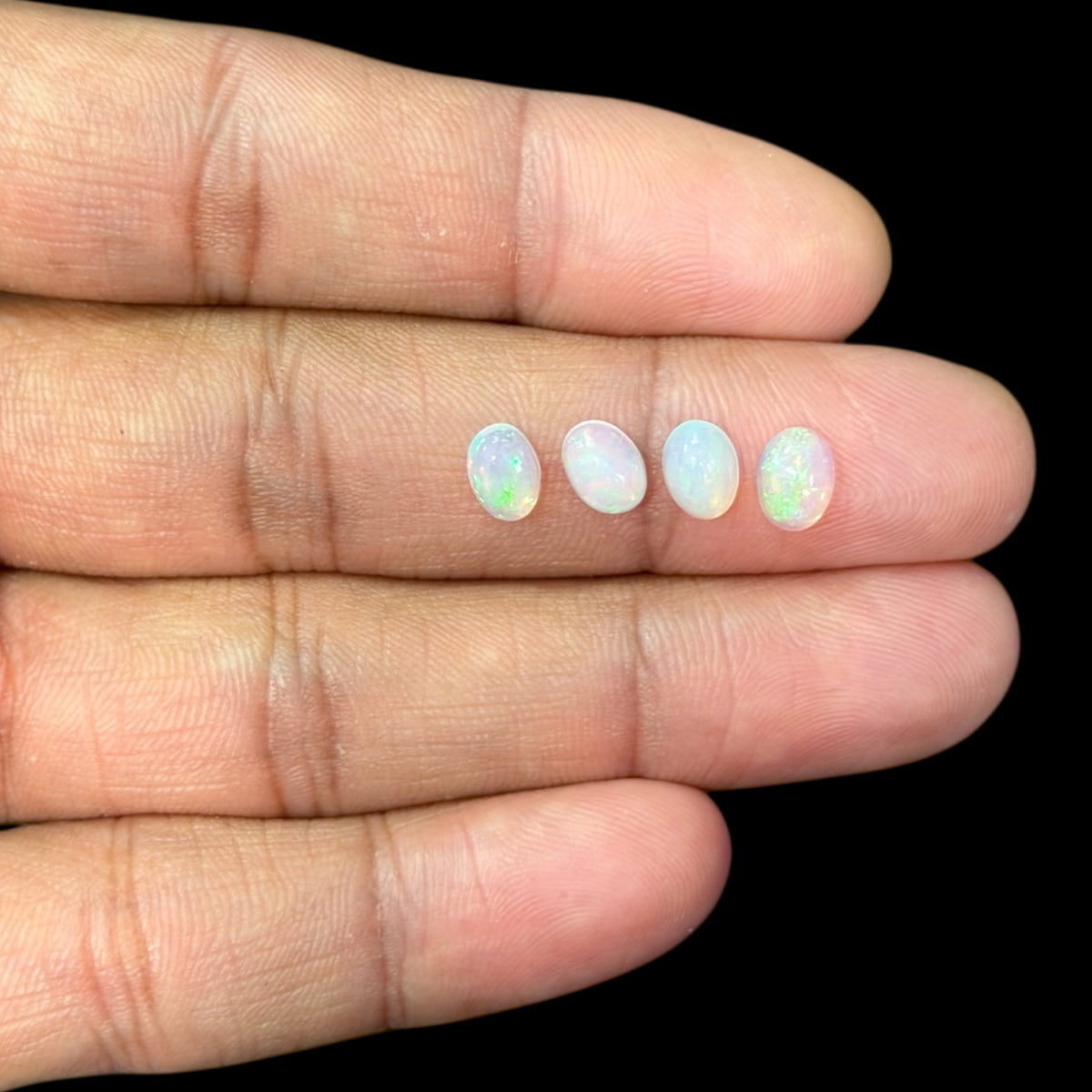 Natural White Ethiopian Opal Stone 15.81 Carats Oval Cabochon Shape  7 x 5 mm