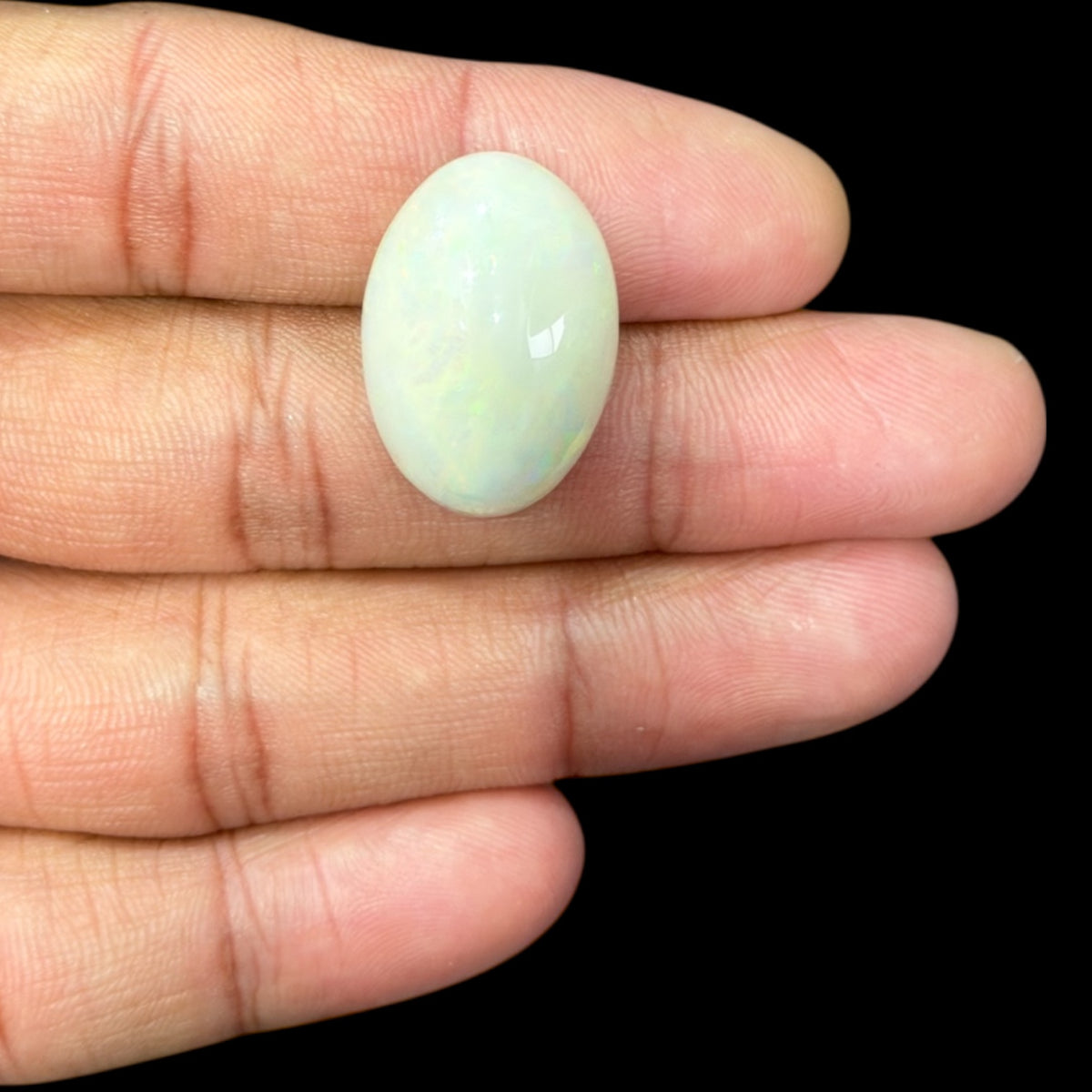Natural White Ethiopian Opal Stone 16.06 Carats Oval Cabochon Shape 24.6 x 17 x 7.8 mm