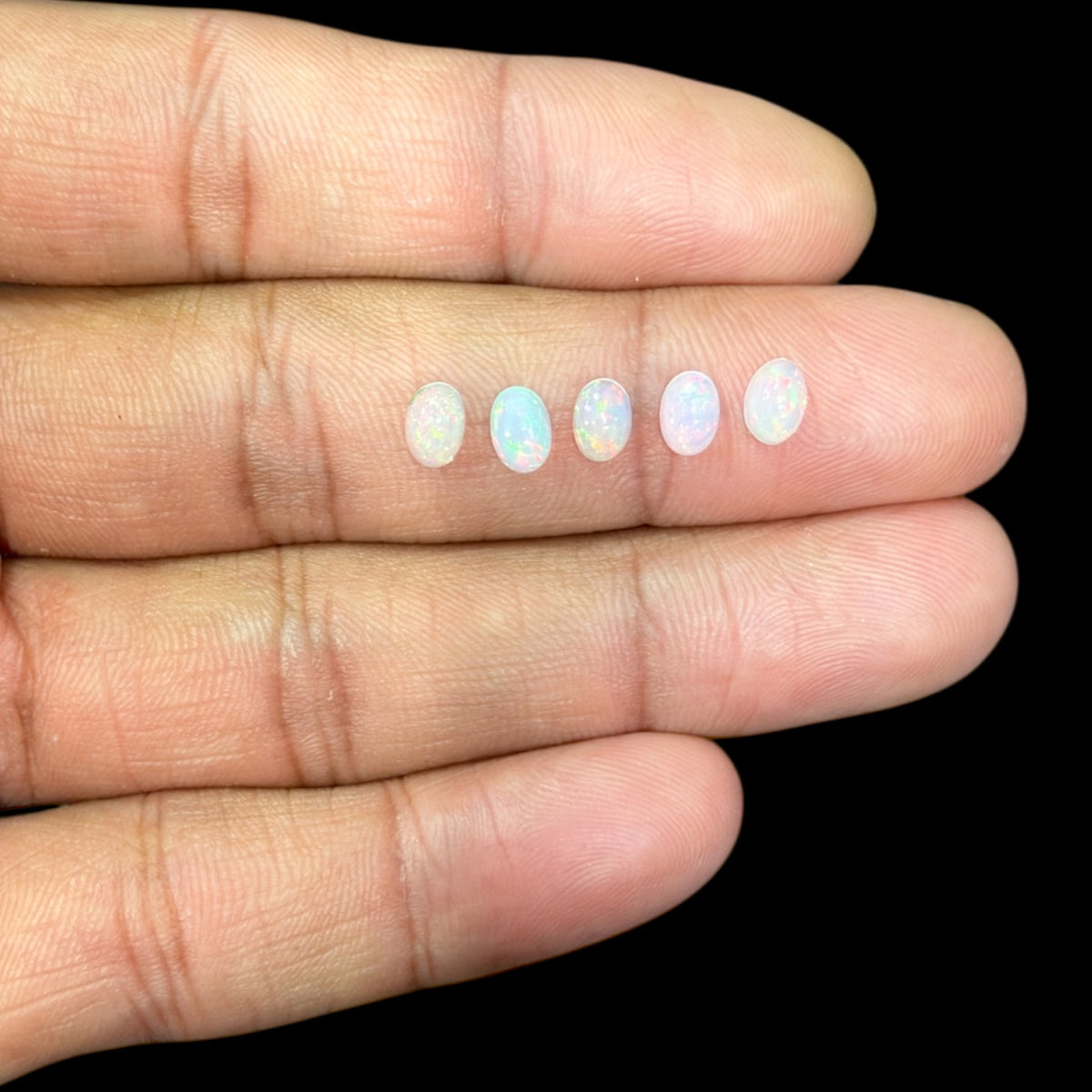 Natural White Ethiopian Opal Stone 16.81 Carats Oval Cabochon Shape 6 x 4 mm