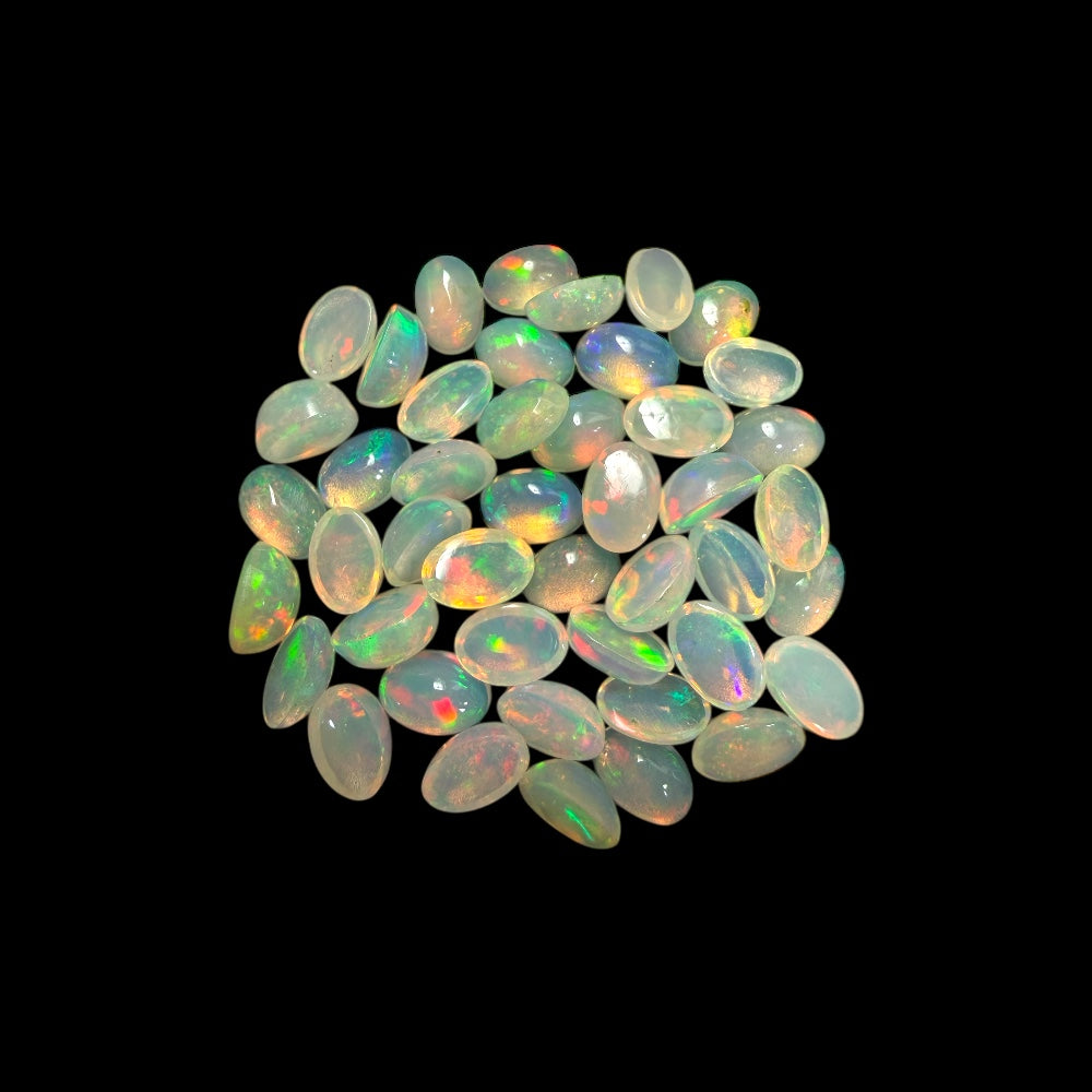 Natural White Ethiopian Opal Stone 16.81 Carats Oval Cabochon Shape 6 x 4 mm