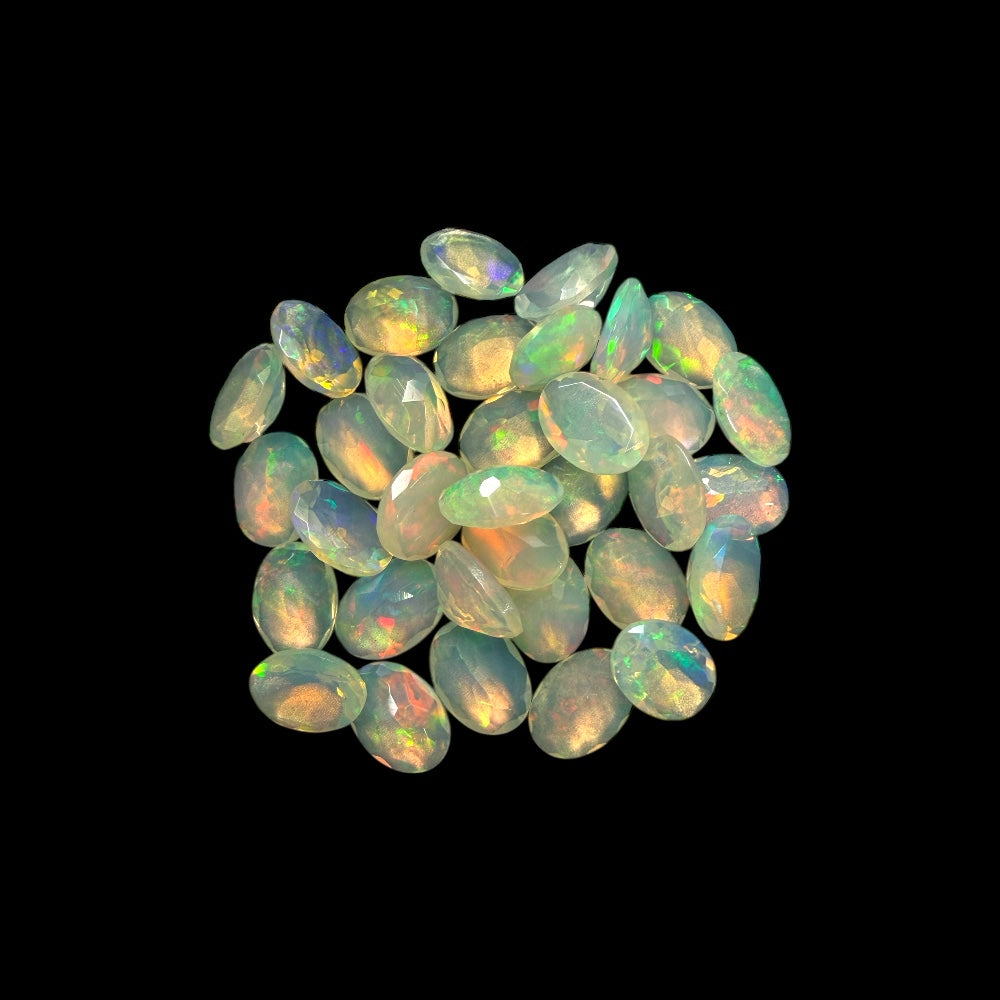 Natural White Ethiopian Opal Stone 17.15 Carats Oval Cabochon Shape 7 x 5 mm