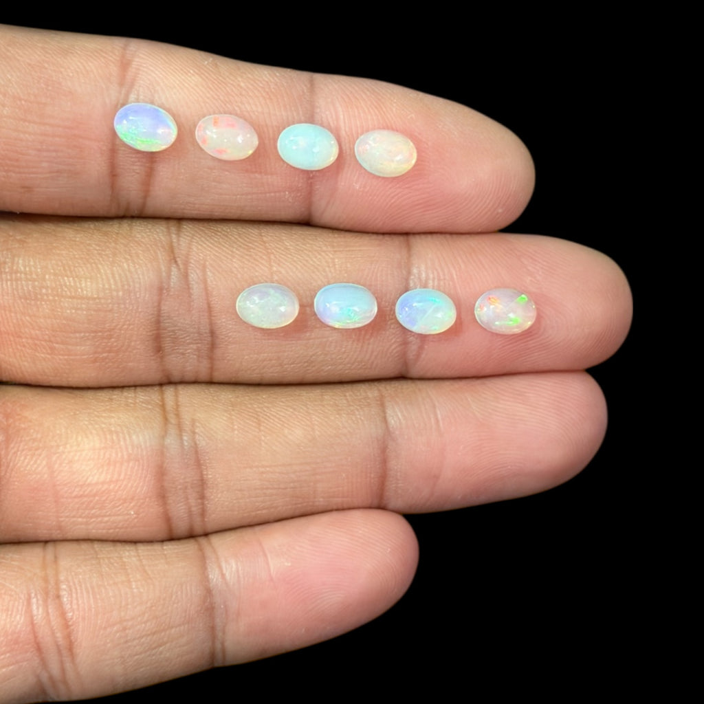 Natural White Ethiopian Opal Stone 17.27 Carats Oval Cabochon Shape 7 x 5 mm