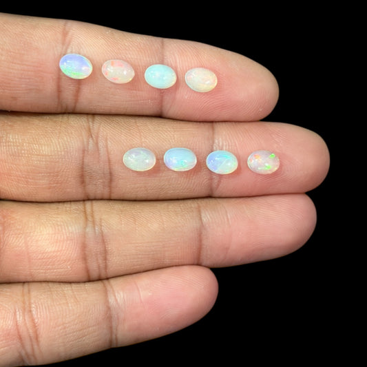 Natural White Ethiopian Opal Stone 17.27 Carats Oval Cabochon Shape 7 x 5 mm