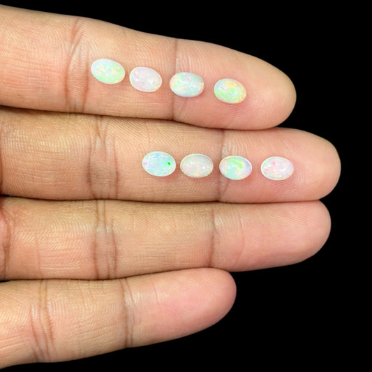 Natural White Ethiopian Opal Stone 18.40 Carats Oval Cabochon Shape 7 x 5 mm