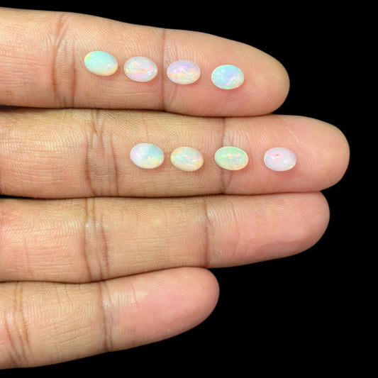 Natural White Ethiopian Opal Stone 19.75 Carats Oval Cabochon Shape 7 x 5 mm