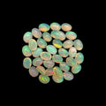 Natural White Ethiopian Opal Stone 19.75 Carats Oval Cabochon Shape 7 x 5 mm