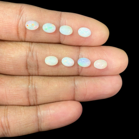 Natural White Ethiopian Opal Stone 19.87 Carats Oval Cabochon Shape 7 x 5 mm
