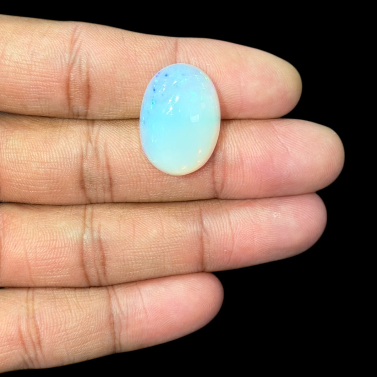 Natural White Ethiopian Opal Stone 20.12 Carats Oval Cabochon Shape 23.3 x 16.7 x 9.7 mm