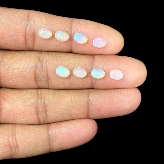 Natural White Ethiopian Opal Stone 20.80 Carats Oval Cabochon Shape 7 x 5 mm