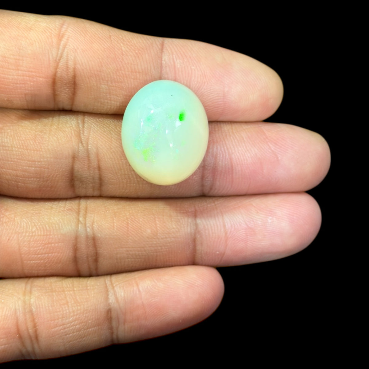 Natural White Ethiopian Opal Stone 21.17 Carats Oval Cabochon Shape 21.8 x 18 x 11.3 mm