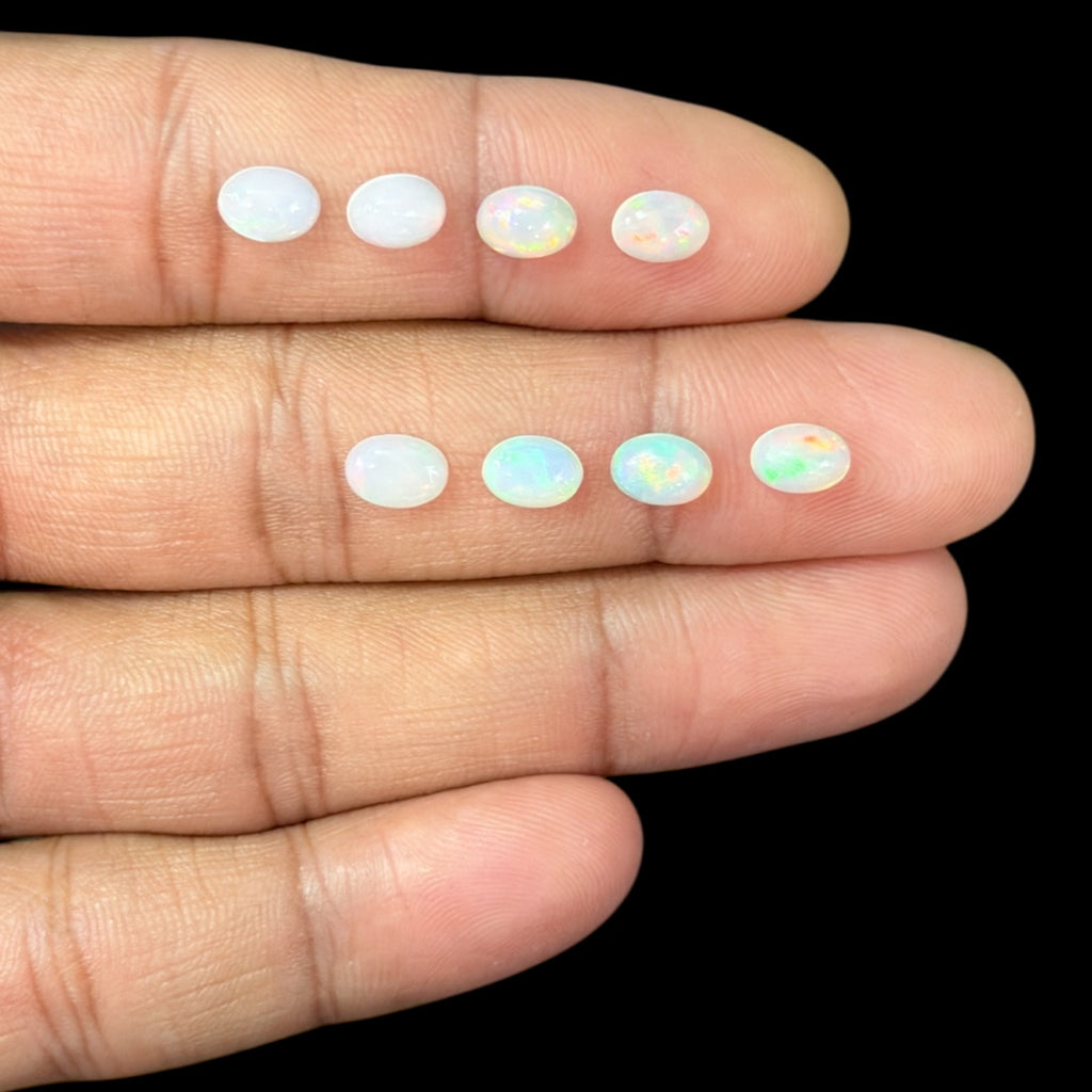 Natural White Ethiopian Opal Stone 22.75 Carats Oval Cabochon Shape 7 x 5 mm