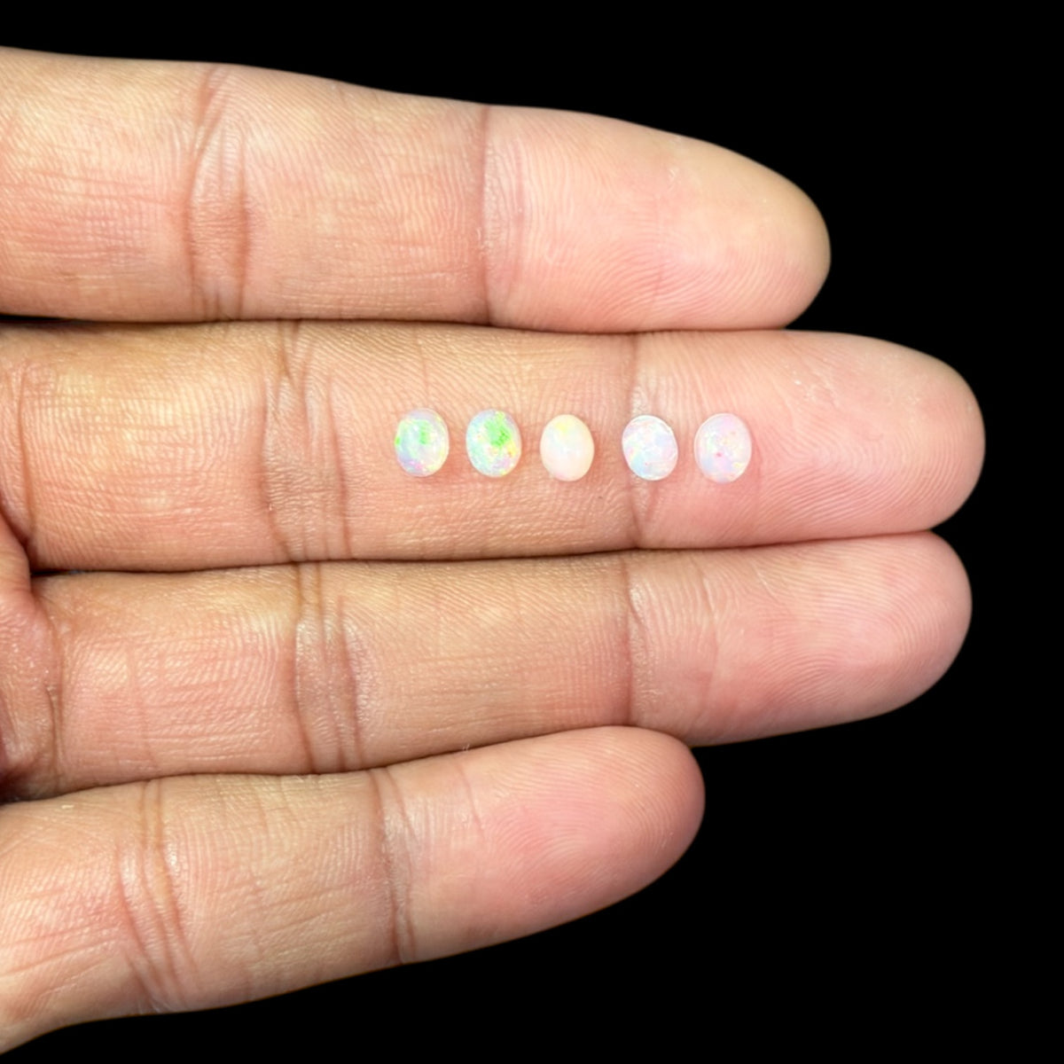 Natural White Ethiopian Opal Stone 22.86 Carats Oval Cabochon Shape 5 x 4 mm