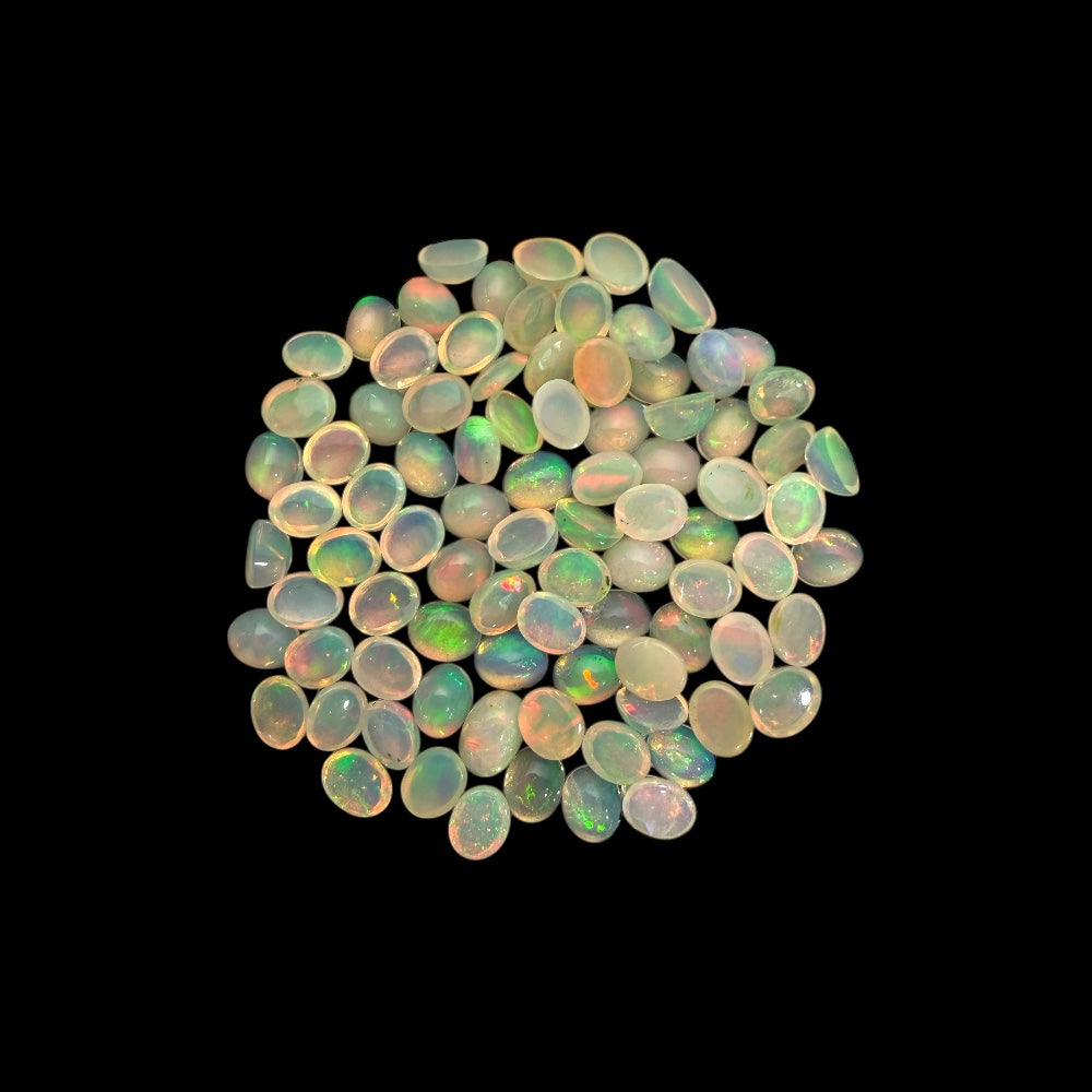 Natural White Ethiopian Opal Stone 22.86 Carats Oval Cabochon Shape 5 x 4 mm