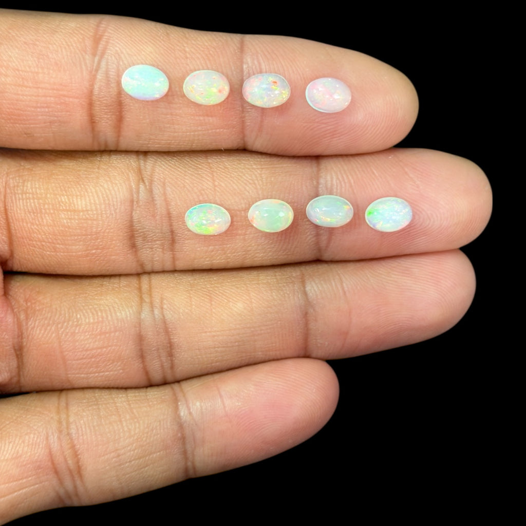 Natural White Ethiopian Opal Stone 22.93 Carats Oval Cabochon Shape 7 x 5 mm