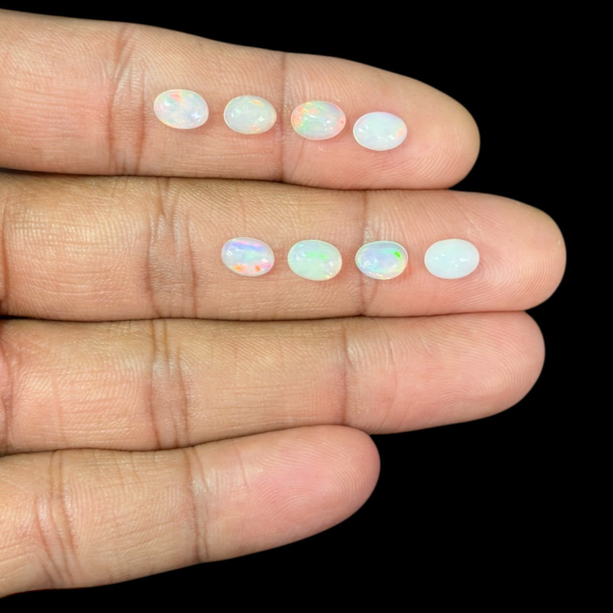Natural White Ethiopian Opal Stone 23.39 Carats Oval Cabochon Shape 7 x 5 mm