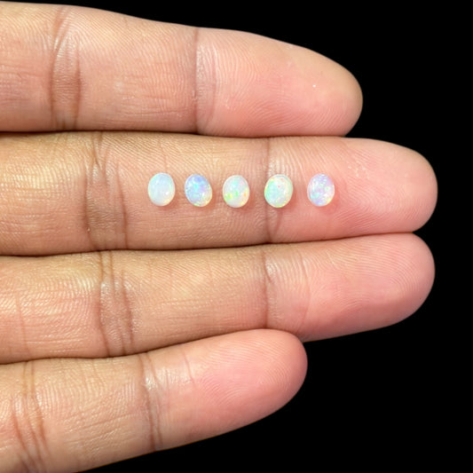 Natural White Ethiopian Opal Stone 23.88 Carats Oval Cabochon Shape 5 x 4 mm