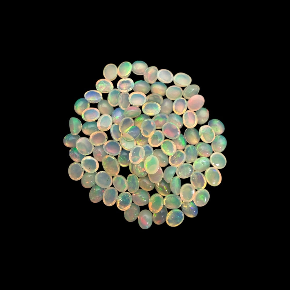 Natural White Ethiopian Opal Stone 23.88 Carats Oval Cabochon Shape 5 x 4 mm