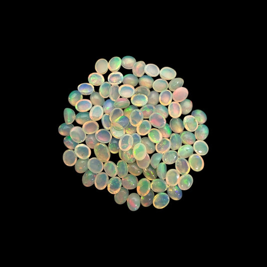 Natural White Ethiopian Opal Stone 23.88 Carats Oval Cabochon Shape 5 x 4 mm