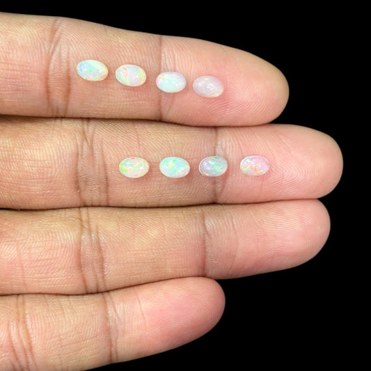 Natural White Ethiopian Opal Stone 24.29 Carats Oval Cabochon Shape 6 x 4 mm