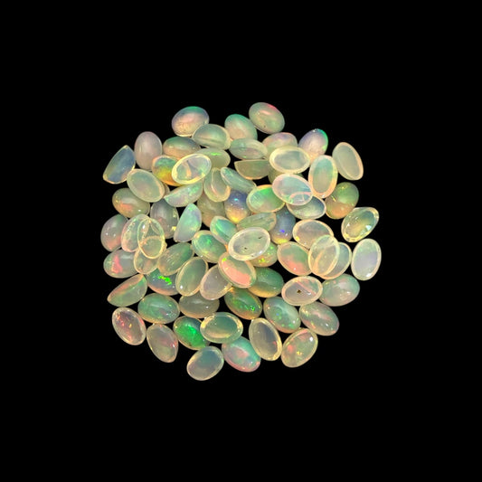 Natural White Ethiopian Opal Stone 24.29 Carats Oval Cabochon Shape 6 x 4 mm