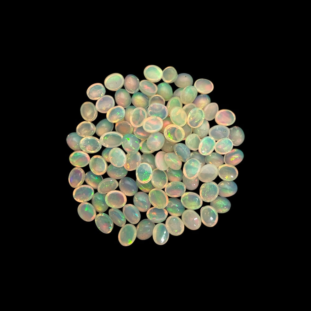 Natural White Ethiopian Opal Stone 24.72 Carats Oval Cabochon Shape 5 x 4 mm  