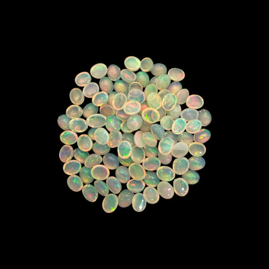 Natural White Ethiopian Opal Stone 24.72 Carats Oval Cabochon Shape 5 x 4 mm  