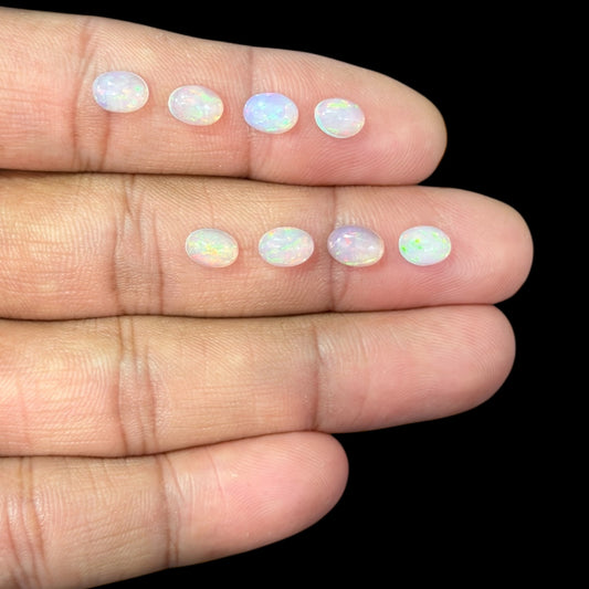 Natural White Ethiopian Opal Stone 24.79 Carats Oval Cabochon Shape 7 x 5 mm