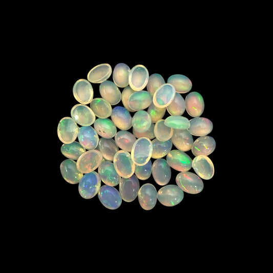 Natural White Ethiopian Opal Stone 24.79 Carats Oval Cabochon Shape 7 x 5 mm