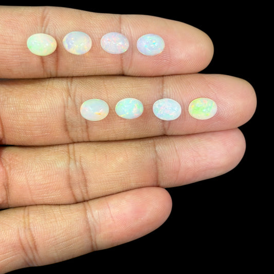 Natural White Ethiopian Opal Stone 24.92 Carats Oval Cabochon Shape 8 x 6 mm