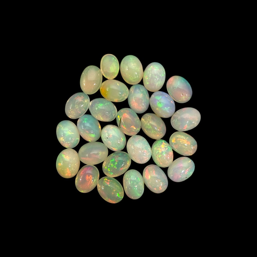Natural White Ethiopian Opal Stone 24.92 Carats Oval Cabochon Shape 8 x 6 mm
