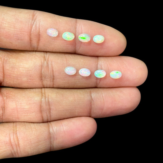 Natural White Ethiopian Opal Stone 25.22 Carats Oval Cabochon Shape 6 x 4 mm