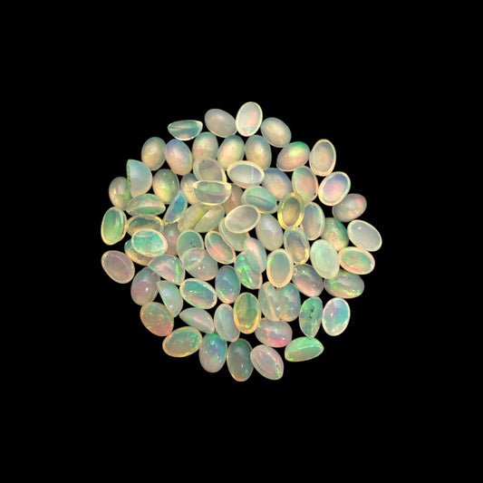 Natural White Ethiopian Opal Stone 25.22 Carats Oval Cabochon Shape 6 x 4 mm